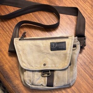 Tumi Tech Small Messenger bag in distressed canvas with many handy pockets